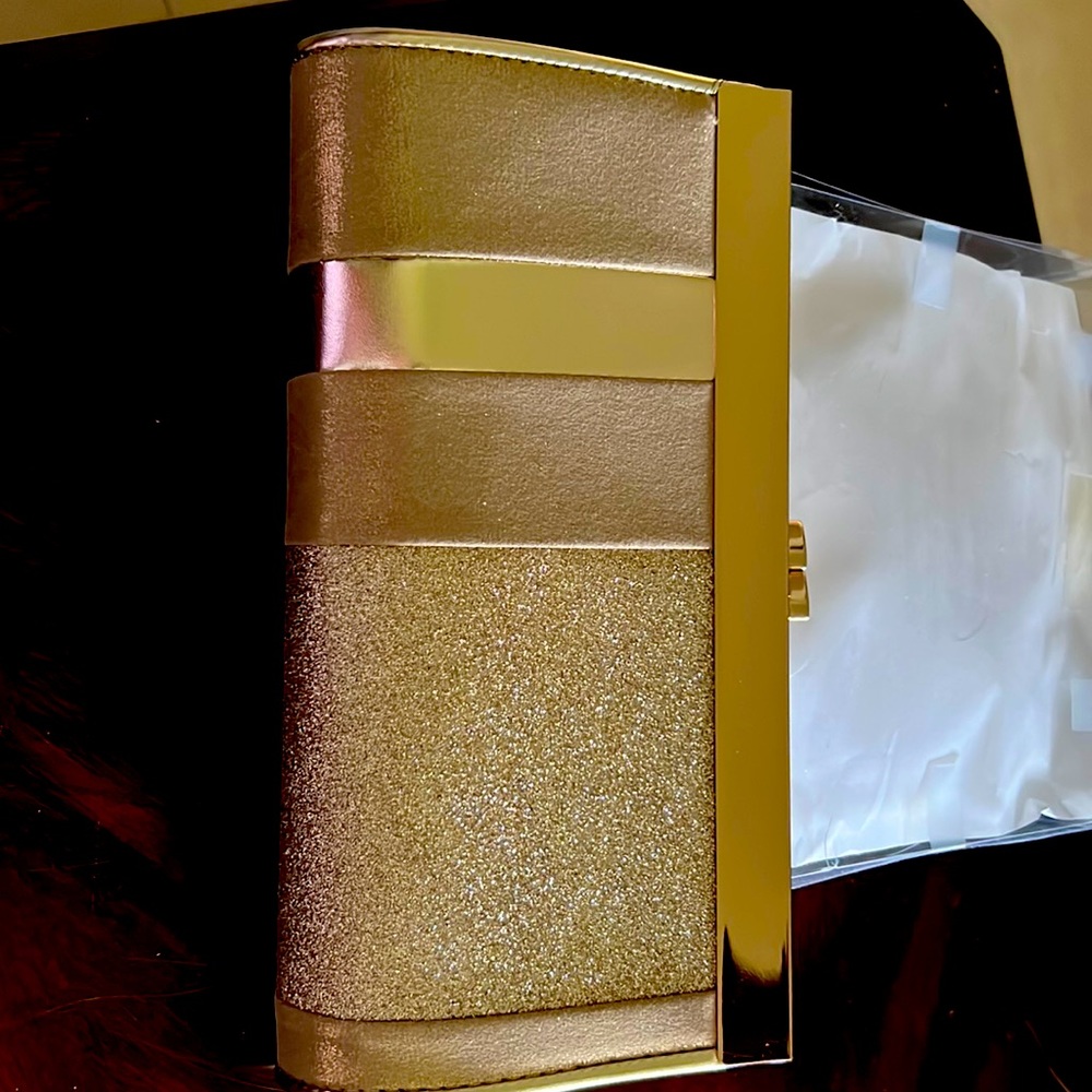 New never used gold Kate Landry evening bag